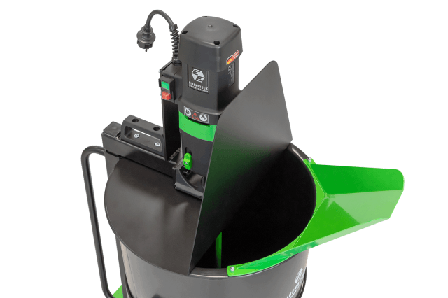 Mixing station A green and black electric mixer with a bowl attachment, designed for mixing materials.